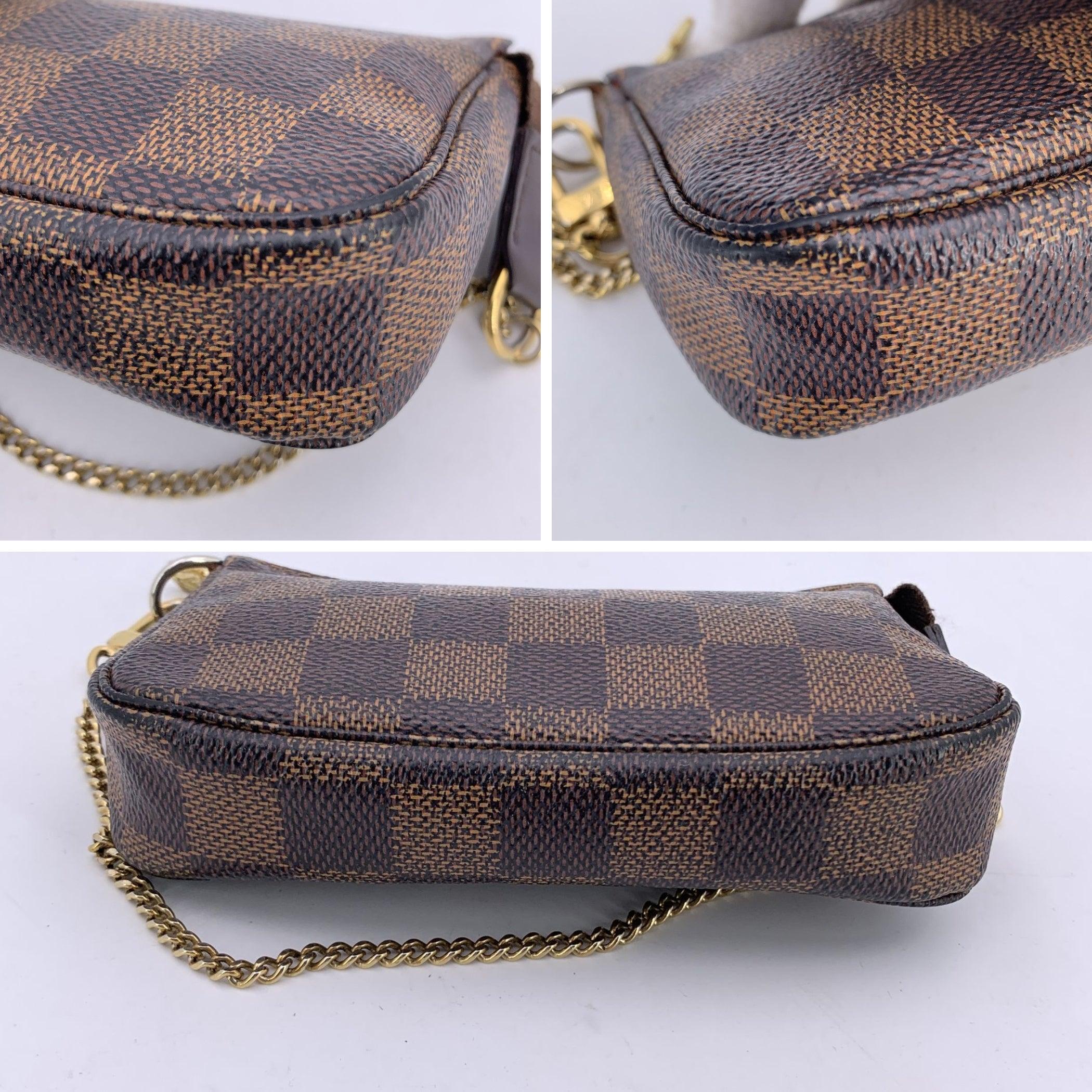Women's Louis Vuitton Damier Ebene Mini Pochette Accessoires Pouch Bag