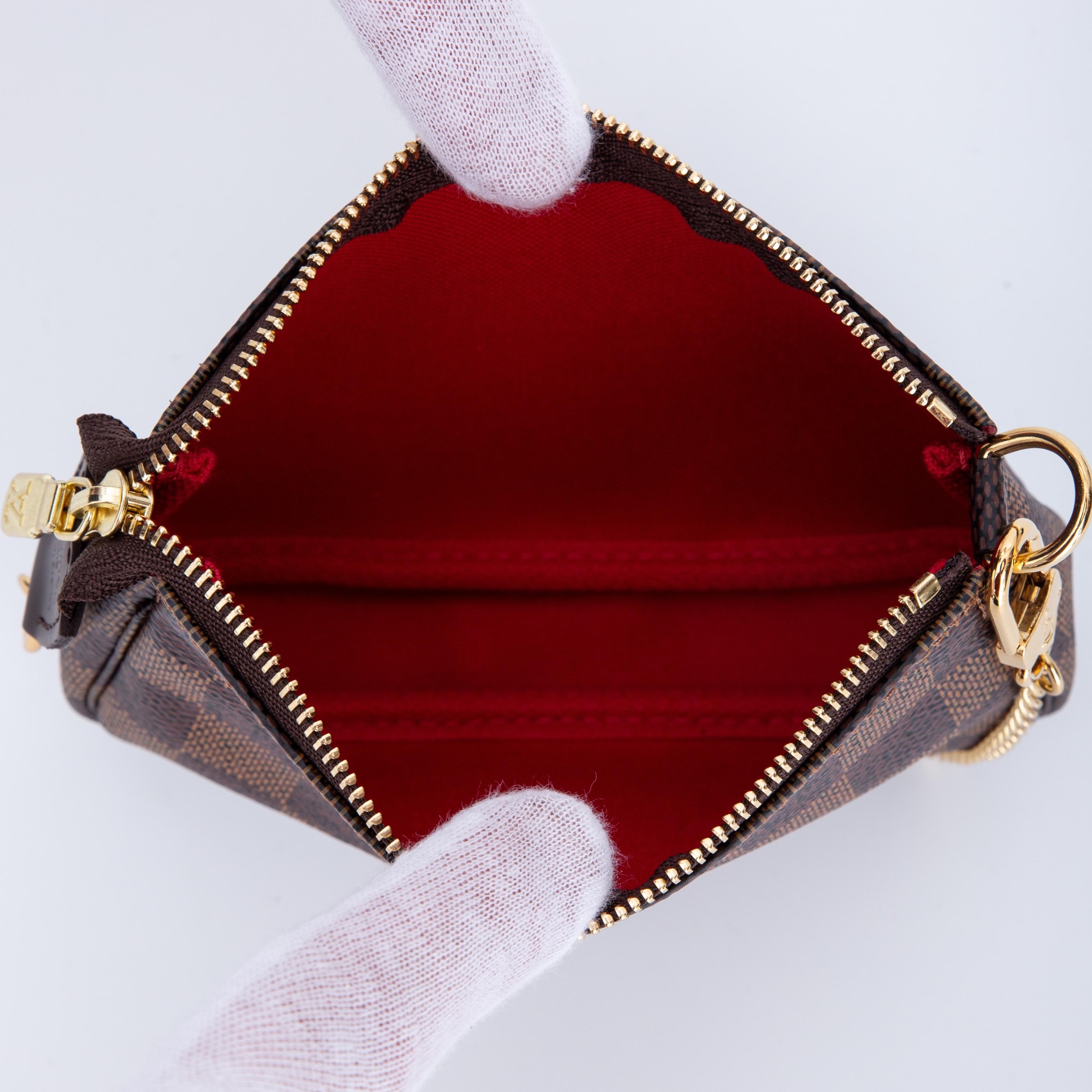 Women's or Men's Louis Vuitton Damier Ebene Mini Pochette Accessories (2020) For Sale