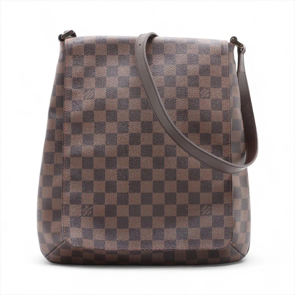 The Louis Vuitton Damier Ebene Musette Salsa is a sleek and stylish shoulder bag that embodies understated elegance. Crafted from the house’s signature Damier Ebene coated canvas, it features a compact, structured silhouette with smooth brown