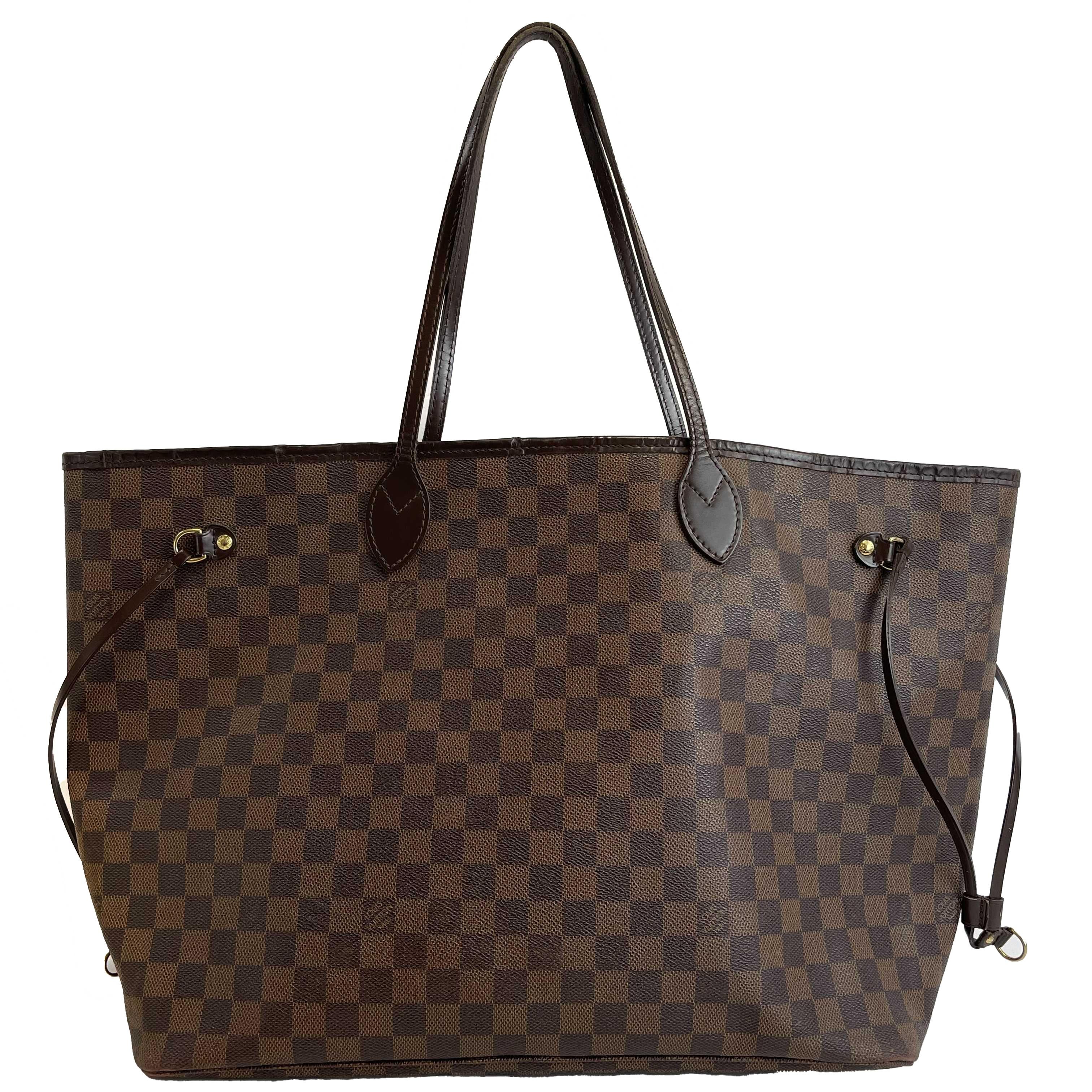 Louis Vuitton - Damier Ebene Neverfull GM - Brown Tote
Measurements

Width: 21 in / 53.34 cm
Height: 13 in / 33.02 cm
Depth: 7.9 in / 20.066 cm
Handle Drop: 9 in / 22.86 cm
Details

Made In: France
Color: Brown
Accessories: Dust Bag
Material: Coated