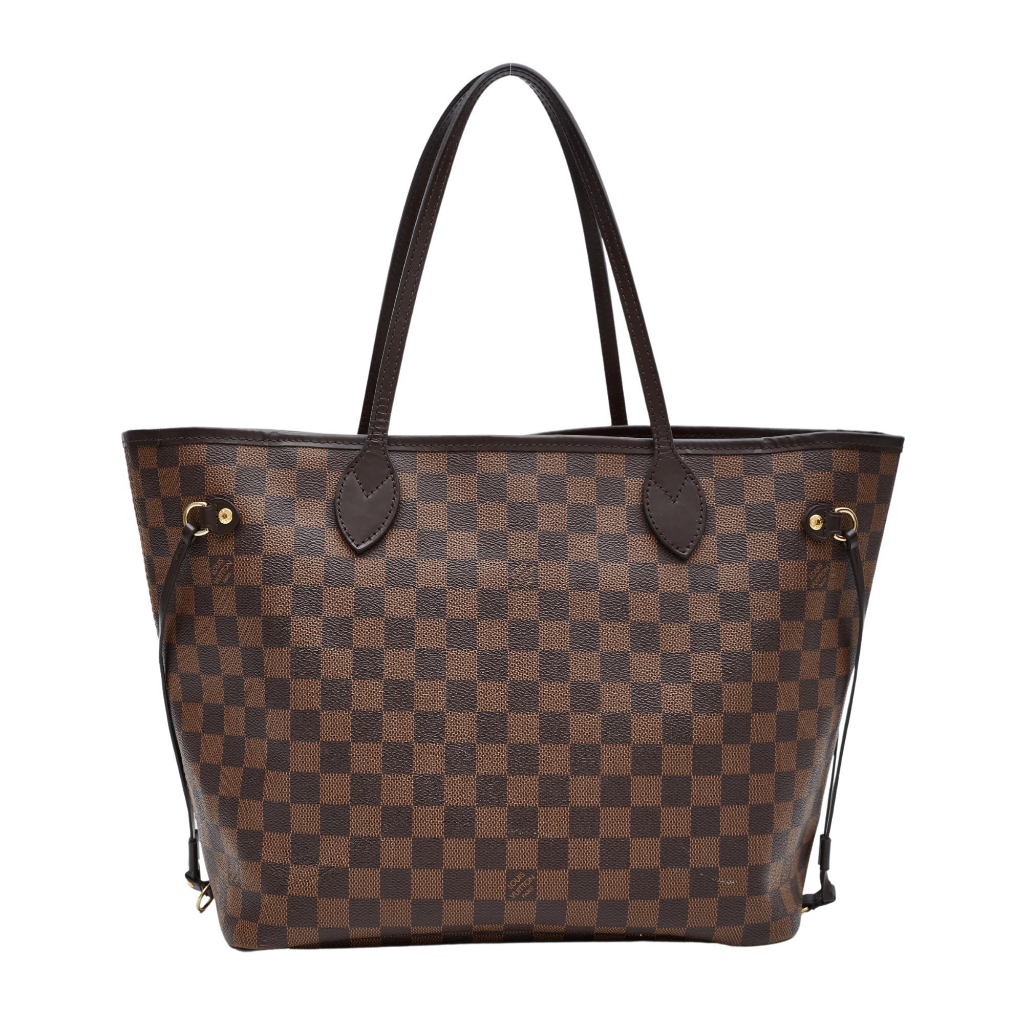 The medium version from Louis Vuitton's classic Neverfull tote collection is made with damier ebene coated canvas with smooth brown leather trim and finishes. The leather on this bag is water and stain resistant. The bag is finished with gold-tone