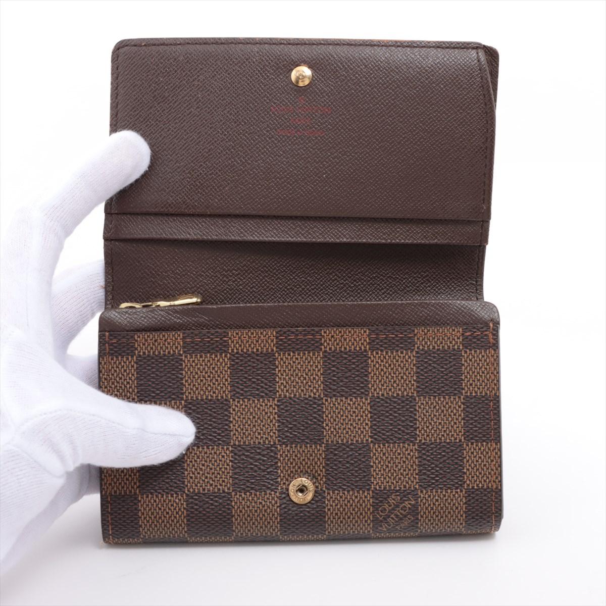 Louis Vuitton Porte-monnaie damier ébène Porte Monnaie Tresor Bon état - En vente à Humacao, PR