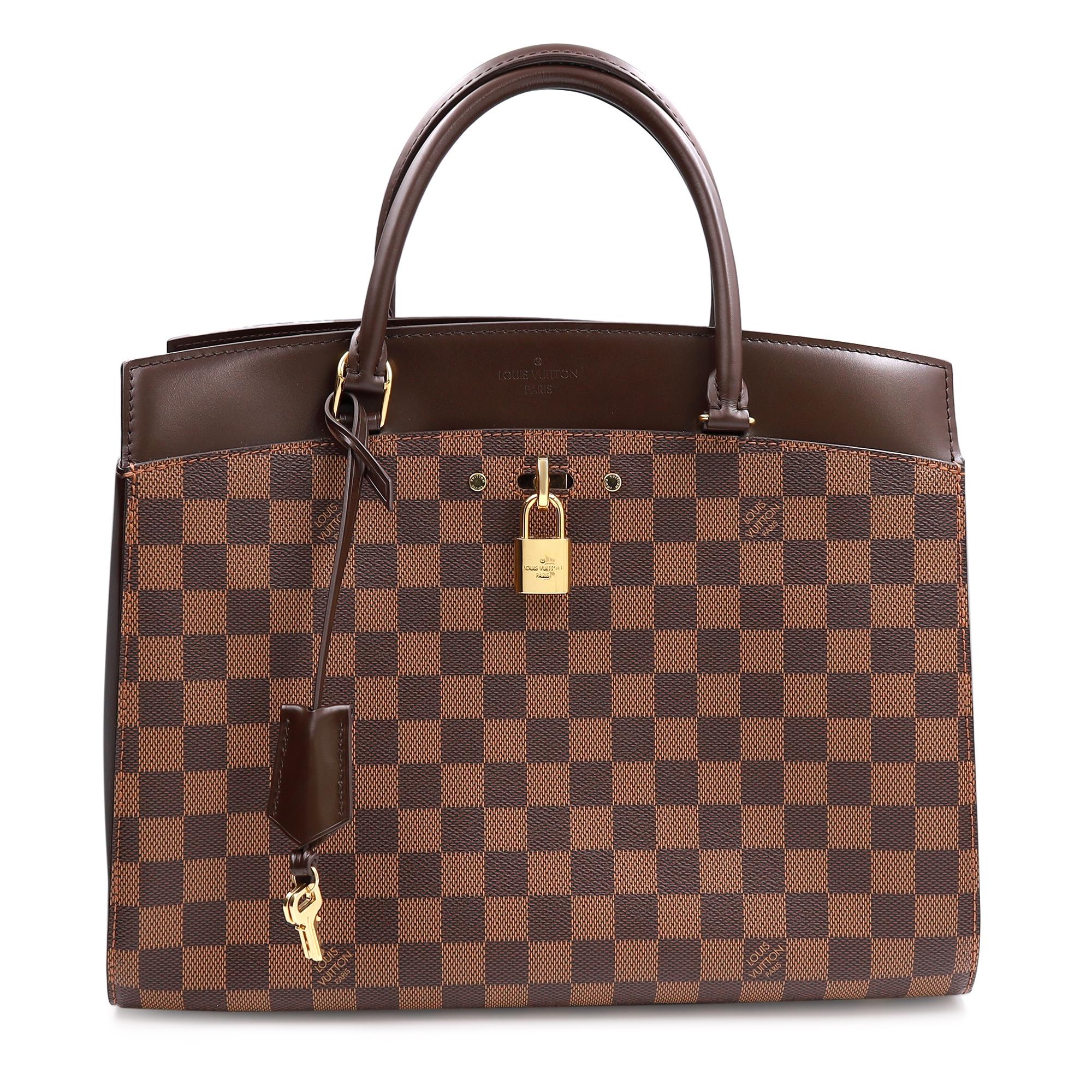 Louis Vuitton Damier Ebene Rivoli MM Brown Tote Handbag. Featuring Damier Ebene checked coated canvas, trimmed with smooth brown leather. Two rolled leather top handles with a detachable strap. Gold tone hardware. Interior zip compartment with three
