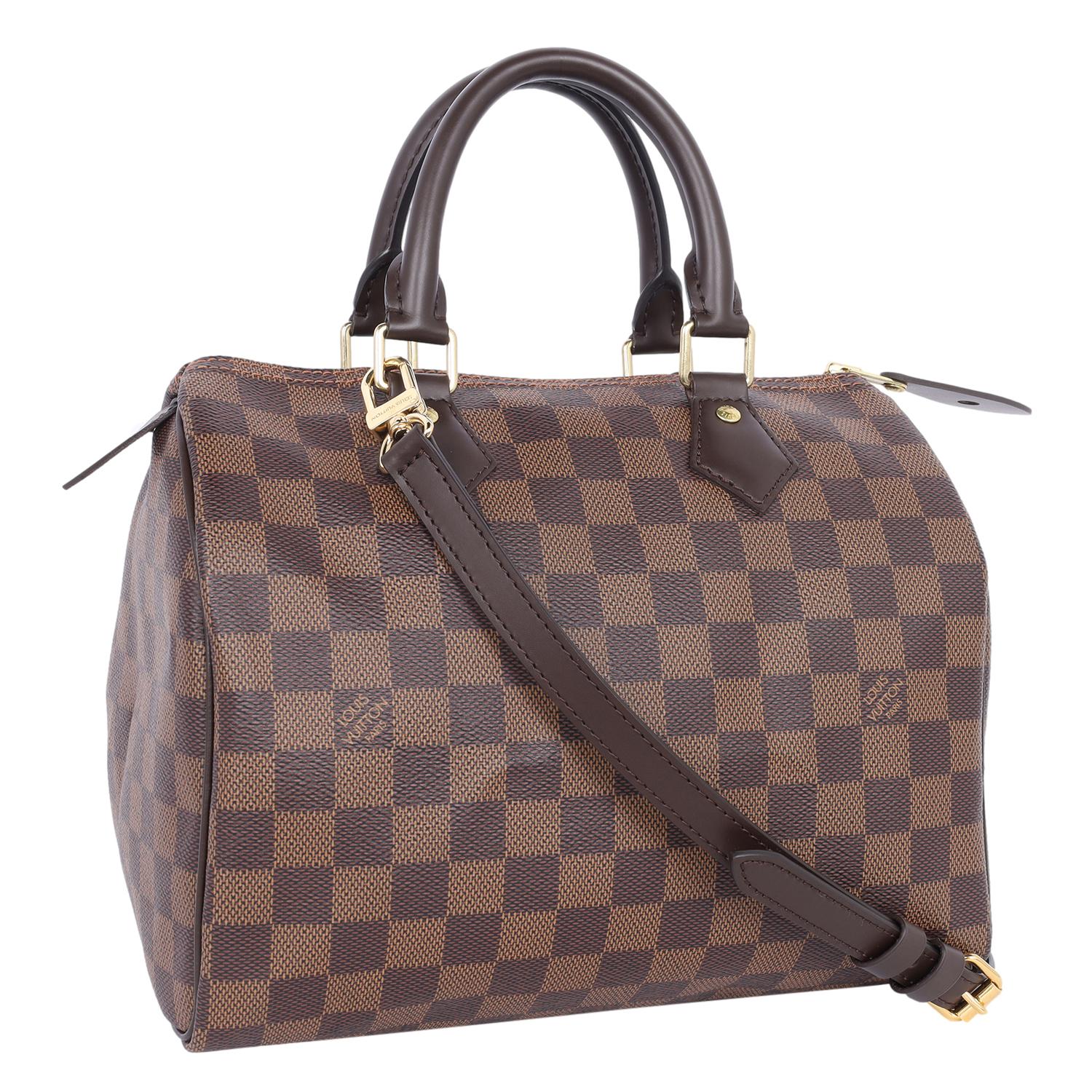 Authentic NEW Louis Vuitton Damier Ebene Speedy 25 with strap. Features Damier Ebene canvas with leather trim, orange textile interior lining with slip pocket, double handles, and zip top closure. Comes with padlock, key and strap. 

Authenticity