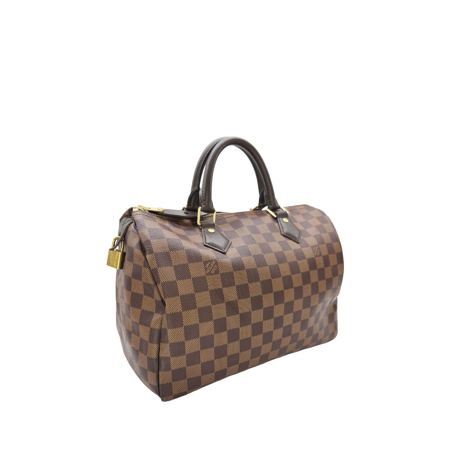 Indulge in the luxury and sophistication of the Louis Vuitton Damier Ebene Speedy 30 Satchel. Exquisitely crafted with coated canvas, leather trimming, and gold-tone hardware, this satchel offers dual rolled handles. The spacious interior, adorned