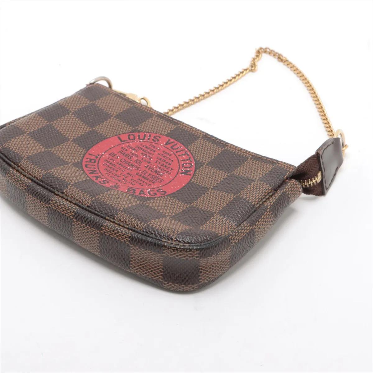 Louis Vuitton Damier Ebene T & B Mini Pochette Accessoires Bon état - En vente à Indianapolis, IN