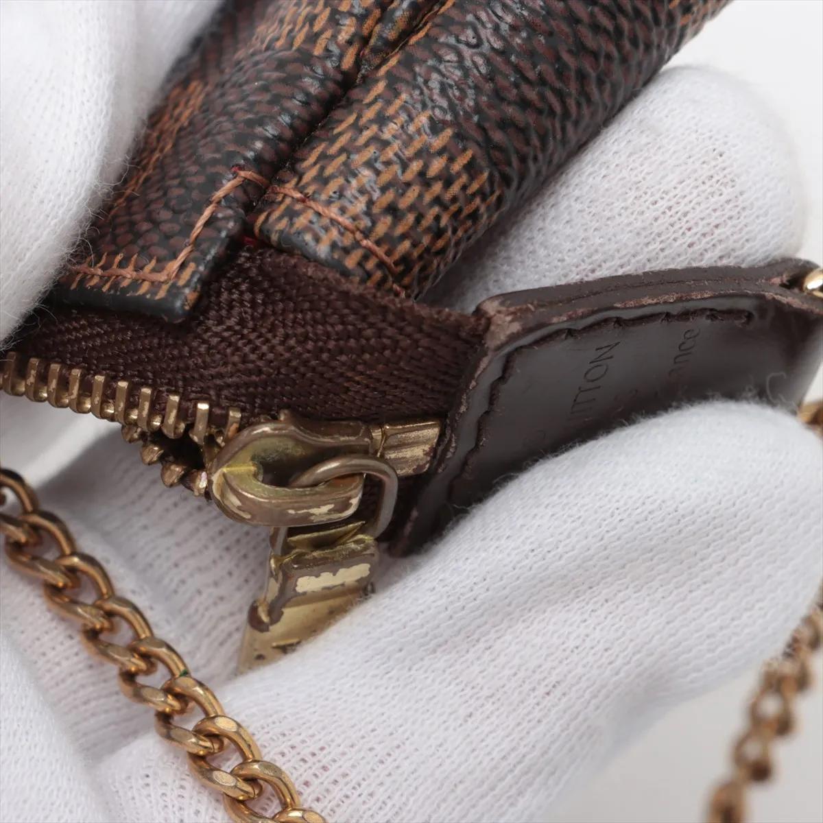 Louis Vuitton Damier Ebene T & B Mini Pochette Accessoires en vente 4