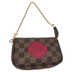 Louis Vuitton - Mini pochette «runks & Bags » en damier ébène