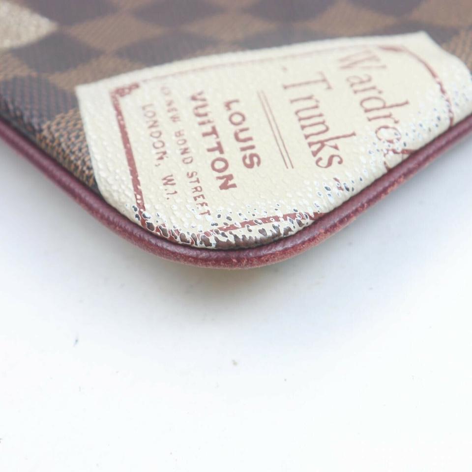 Louis Vuitton Damier Ebene Trunks Pochette Milla Wristlet Bag 862895 In Good Condition For Sale In Dix hills, NY