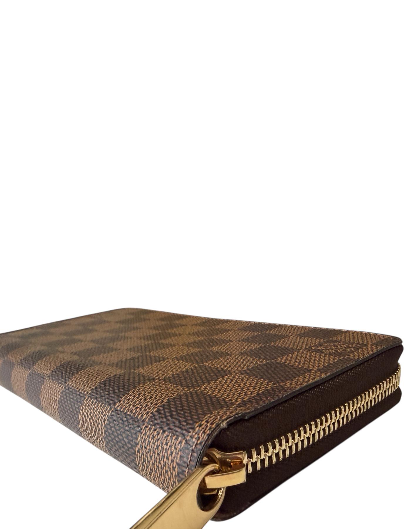 Donna Louis Vuitton Damier Ebene Zippy Wallet w/ Pink Interior in vendita