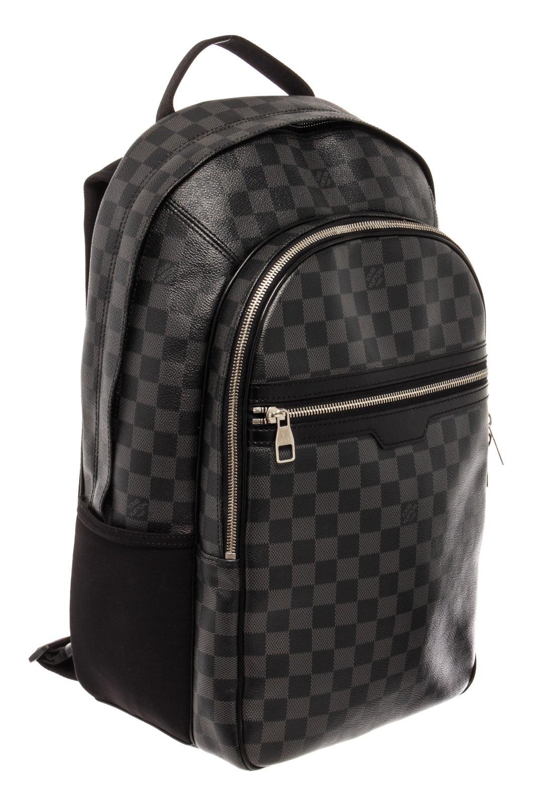 Black and grey Damier Graphite coated canvas Louis Vuitton Michael backpack with silver-tone hardware, black leather trim, dual adjustable shoulder straps, single flat top handle, dual pockets at exterior with zip closures, black canvas lining, five