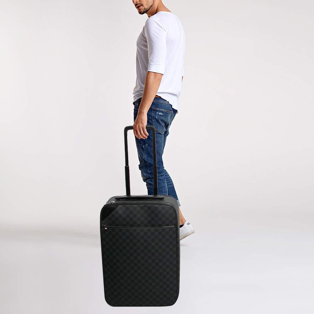 Taking Louis Vuittons legendary art of travel elegantly forward this suitcase crafted from signature materials flaunts traditional craftsmanship and an innovative modern design. Lightweight robust and ultra mobile it glides along smoothly on its