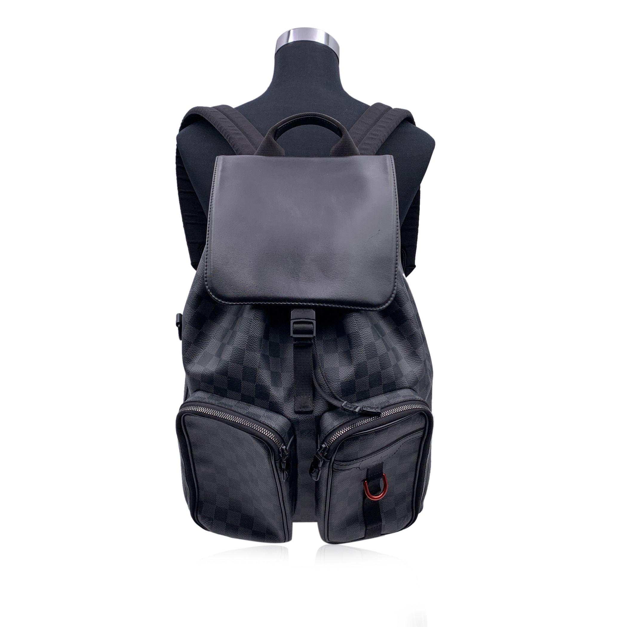 This beautiful Bag will come with a Certificate of Authenticity provided by Entrupy. The certificate will be provided at no further cost Louis Vuitton Damier Graphite 'Utility' Backpack bag, casual and sophisticated at the same time. Damier Graphite