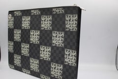 Louis Vuitton Damier graphite clutch – limited edition by Christopher Nemeth