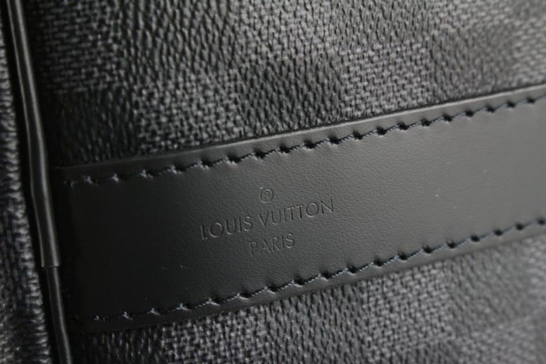 Louis Vuitton Damier Graphite Keepall Bandouliere 55 Duffel Bag (SHF-1 –  LuxeDH