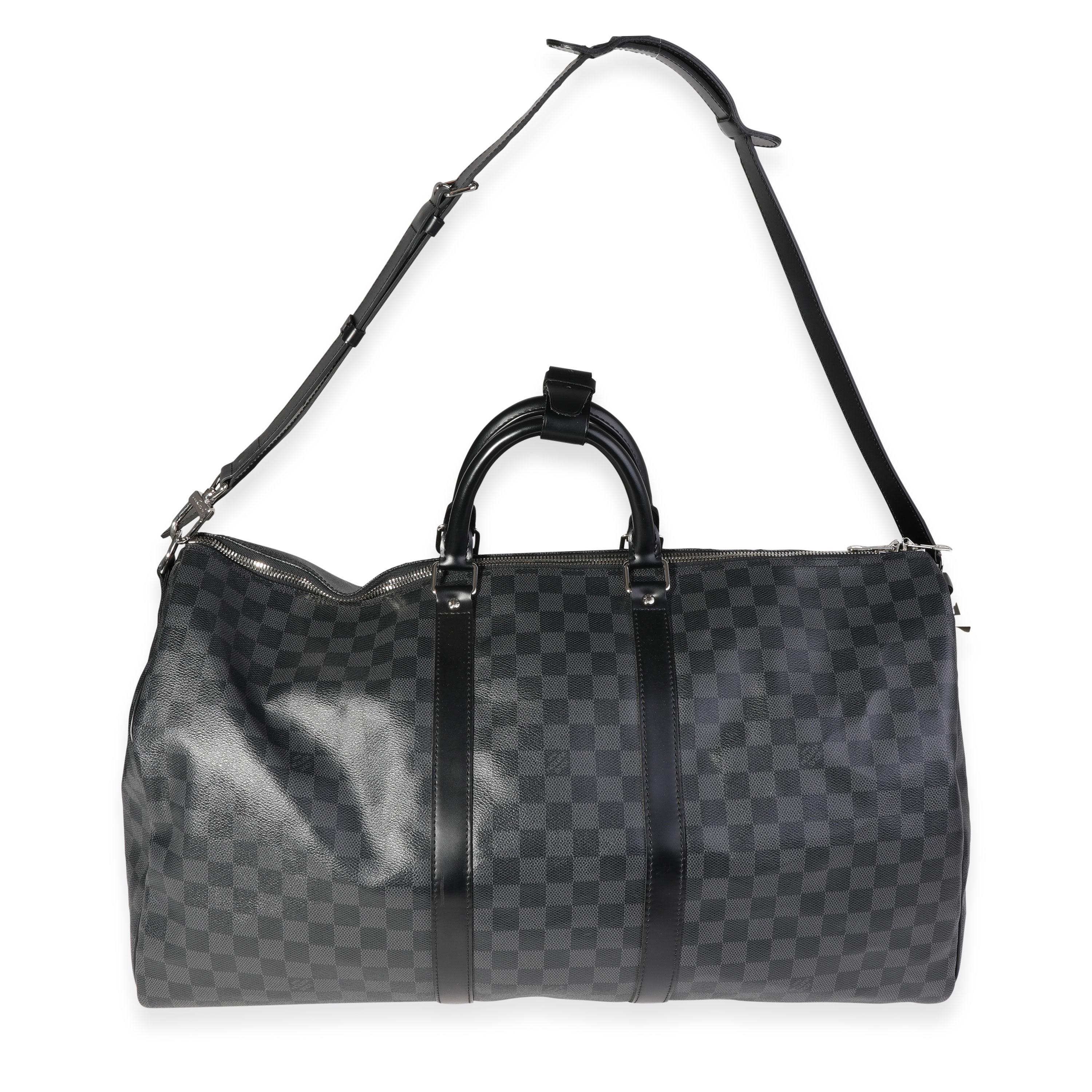 Listing Title: Louis Vuitton Damier Graphite Keepall Bandoulière 55
SKU: 120408
MSRP: 2570.00
Condition: Pre-owned 
Handbag Condition: Very Good
Condition Comments: Very Good Condition. Scratching to hardware. Mark and fading to interior.
Brand: