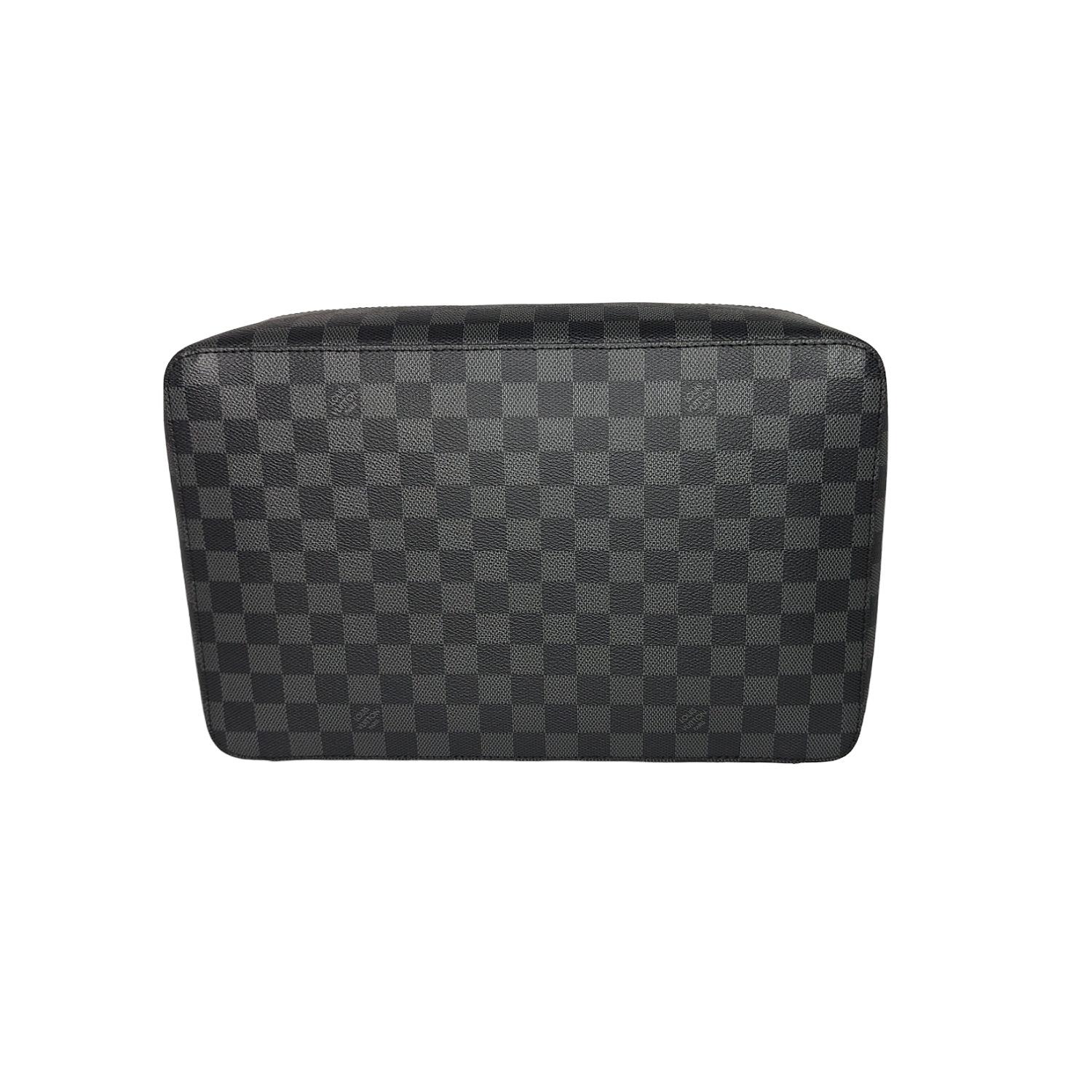 The Packing Cube GM in Damier Graphite canvas with colored leather trim is Louis Vuitton’s latest contribution to the Art of Packing. Although designed for organizing the interior of luggage, it can also be used to store items.

Designer: Louis