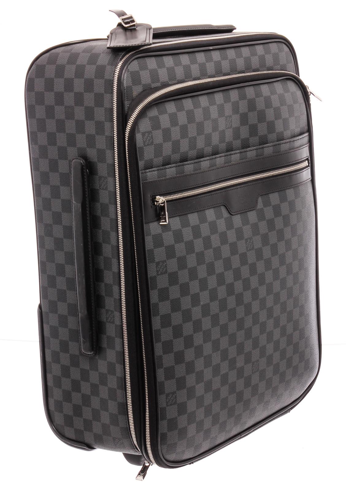 Damier Graphite coated canvas Louis Vuitton Pegase 55 with black Macassar leather trimmings, silver-tone hardware, retractable pull handle, zip pocket at front, dual wheels at base, two internal zip pockets with Velcro security strap, and two-way