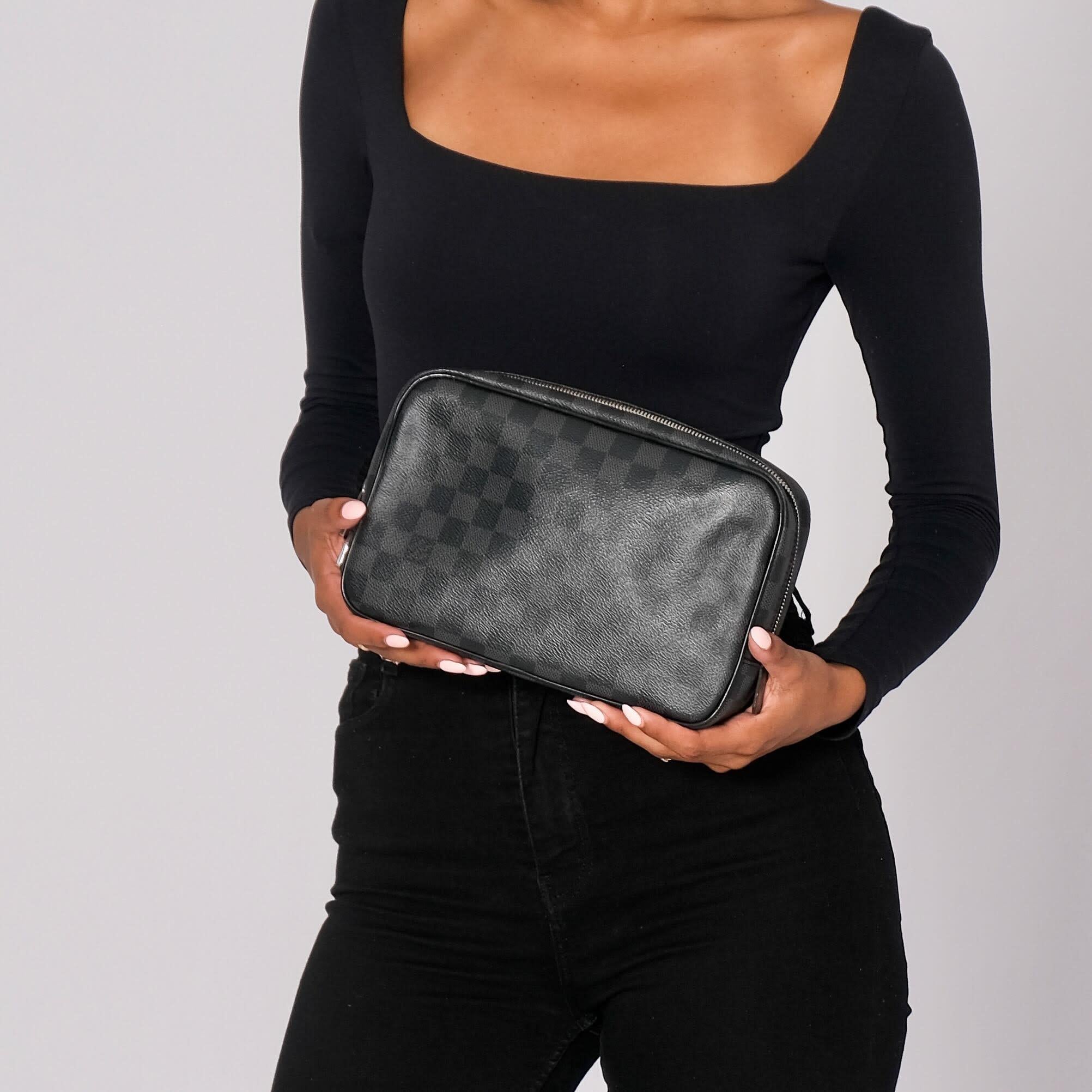 Authenticated by entrupy.

Color: black damier
Material: coated canvas
Date code: BA0139
Year: 2019
Comes with: dust bag, lock & key
Condition: Very good. Faint hairline scratches. Light use.
Made in France

Measurements~
Height 6”
Width 2.5”
Depth