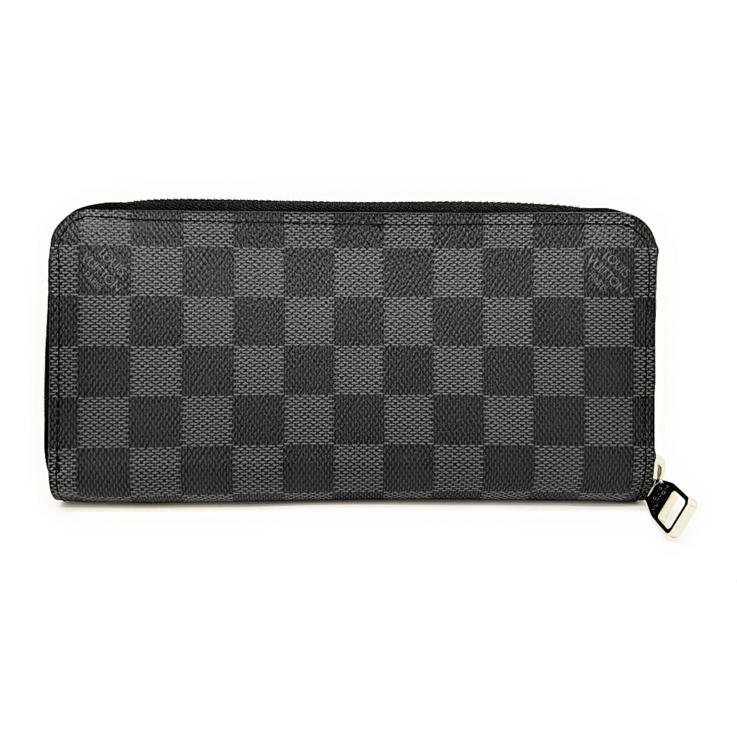 The masculine Zippy Wallet Vertical looks the height of elegance in durable Damier Graphite canvas. With numerous useful pockets and compartments it’s the refined way to carry cash cards and coins. Retail price $830.

Designer: Louis