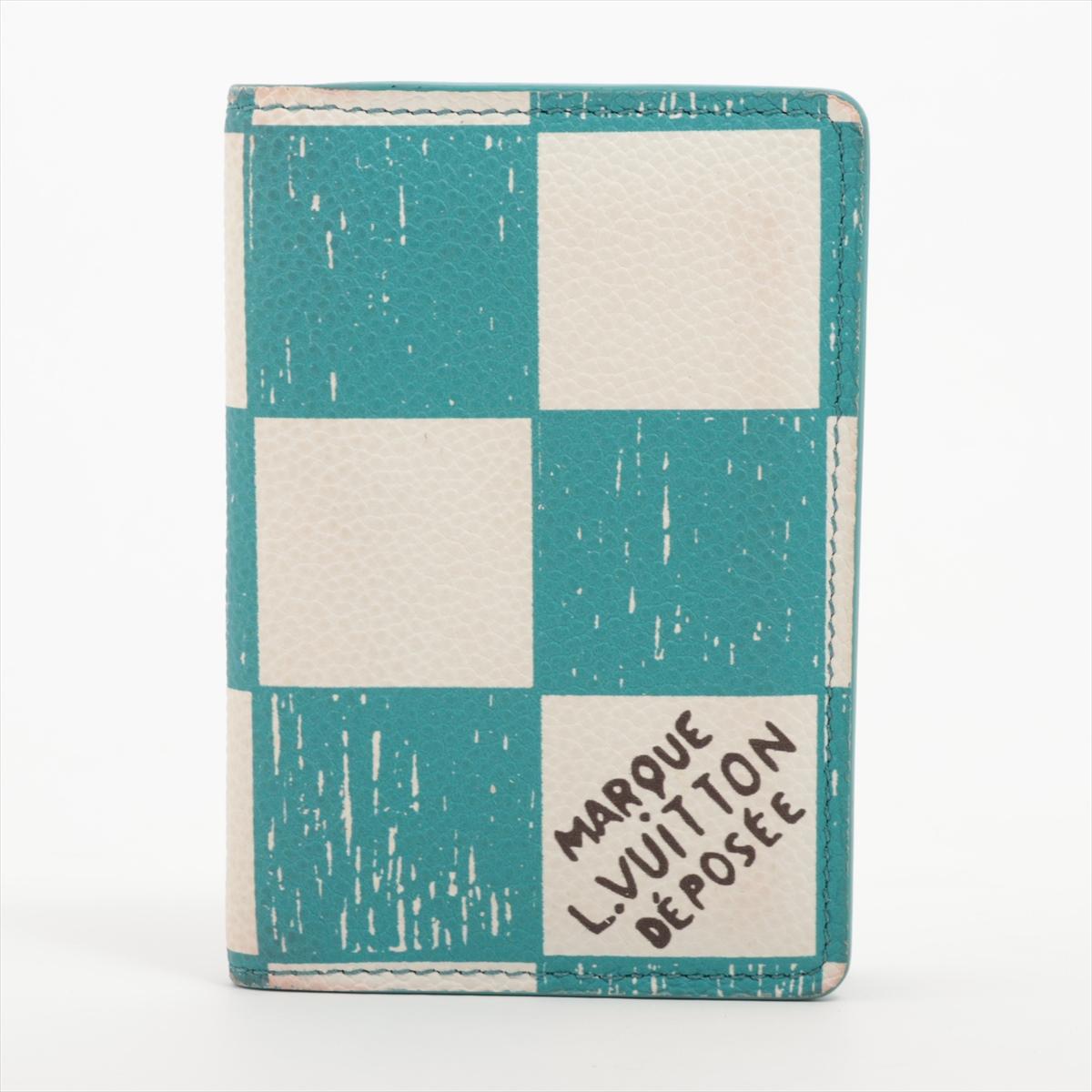 The Louis Vuitton Damier Pocket Organizer Card Case in Turquoise is a stylish and compact accessory that effortlessly combines functionality with a pop of color. Crafted with precision, the card case features the iconic Damier pattern in a vibrant