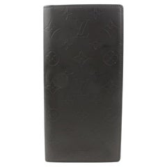 Louis Vuitton Dark Brown Leather Monogram Embossed Bifold Wallet