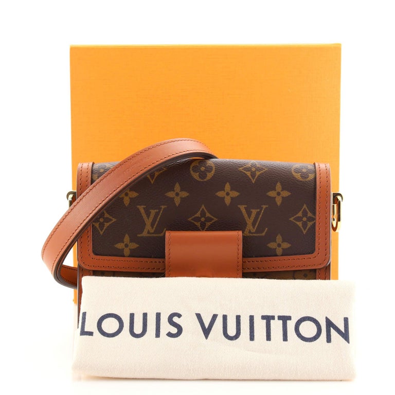 Wearing the Mini Dauphine bag from Louis Vuitton