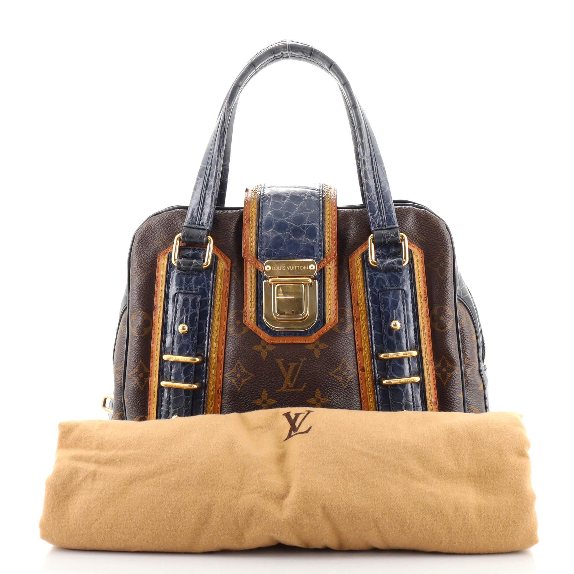 This item can only be shipped within the United States.

Condition: Fair. Creasing on exterior, moderate wear and peeling on base corners, heavy discoloration and wear on handles, scuff on closure trim base, knick on closure trim edge. Heavy scuffs,