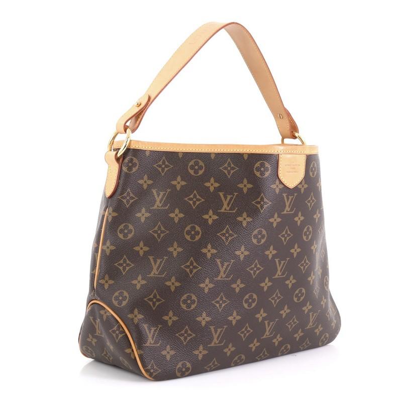 This Louis Vuitton Delightful Handbag Monogram Canvas PM, crafted in brown monogram coated canvas, features a flat leather loop handle, cowhide leather trim, and gold-tone hardware. Its snap hook closure opens to a brown fabric interior with side