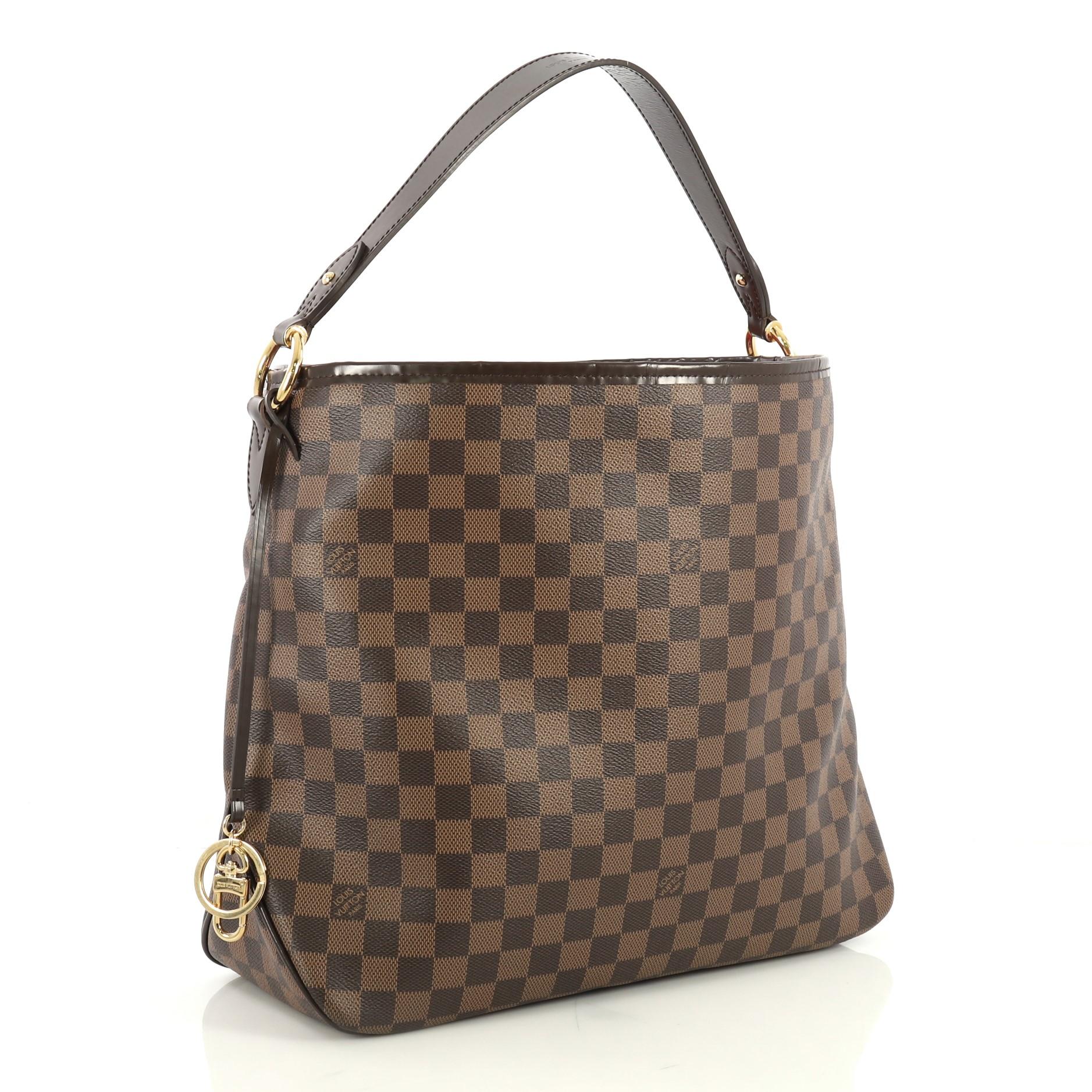 This Louis Vuitton Delightful NM Handbag Damier MM, crafted in damier ebene coated canvas, features a flat leather handle and gold-tone hardware. Its hook closure opens to a red fabric interior with side zip pocket. Authenticity code reads: MI4175.