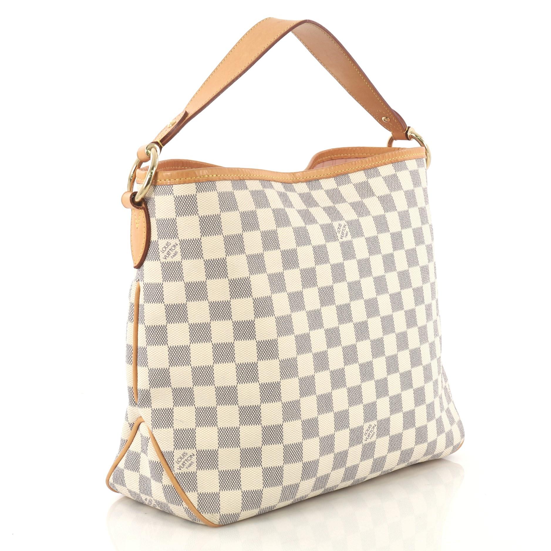 This Louis Vuitton Delightful NM Handbag Damier PM, crafted in damier azur coated canvas, features a flat leather handle and gold-tone hardware. Its hook closure opens to a pink fabric interior with side zip pocket. Authenticity code reads: MI1166.