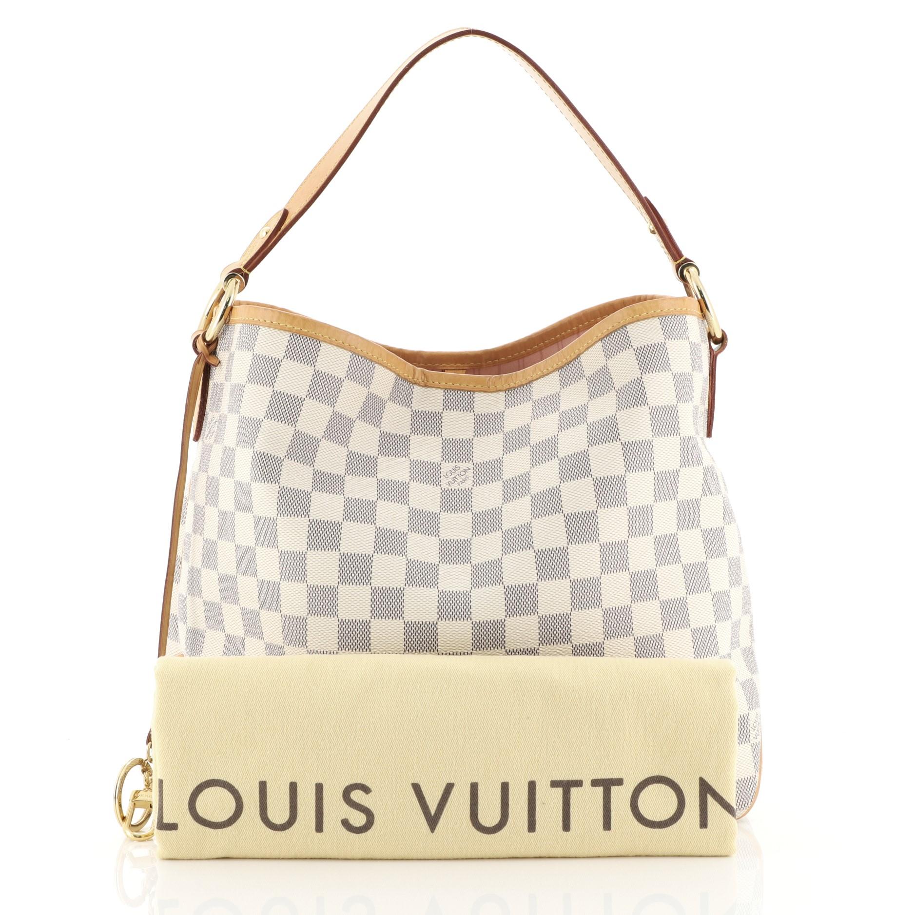 This Louis Vuitton Delightful NM Handbag Damier PM, crafted in damier azur coated canvas, features a flat leather handle and gold-tone hardware. Its hook closure opens to a pink fabric interior with side zip pocket. Authenticity code reads: SD4166.
