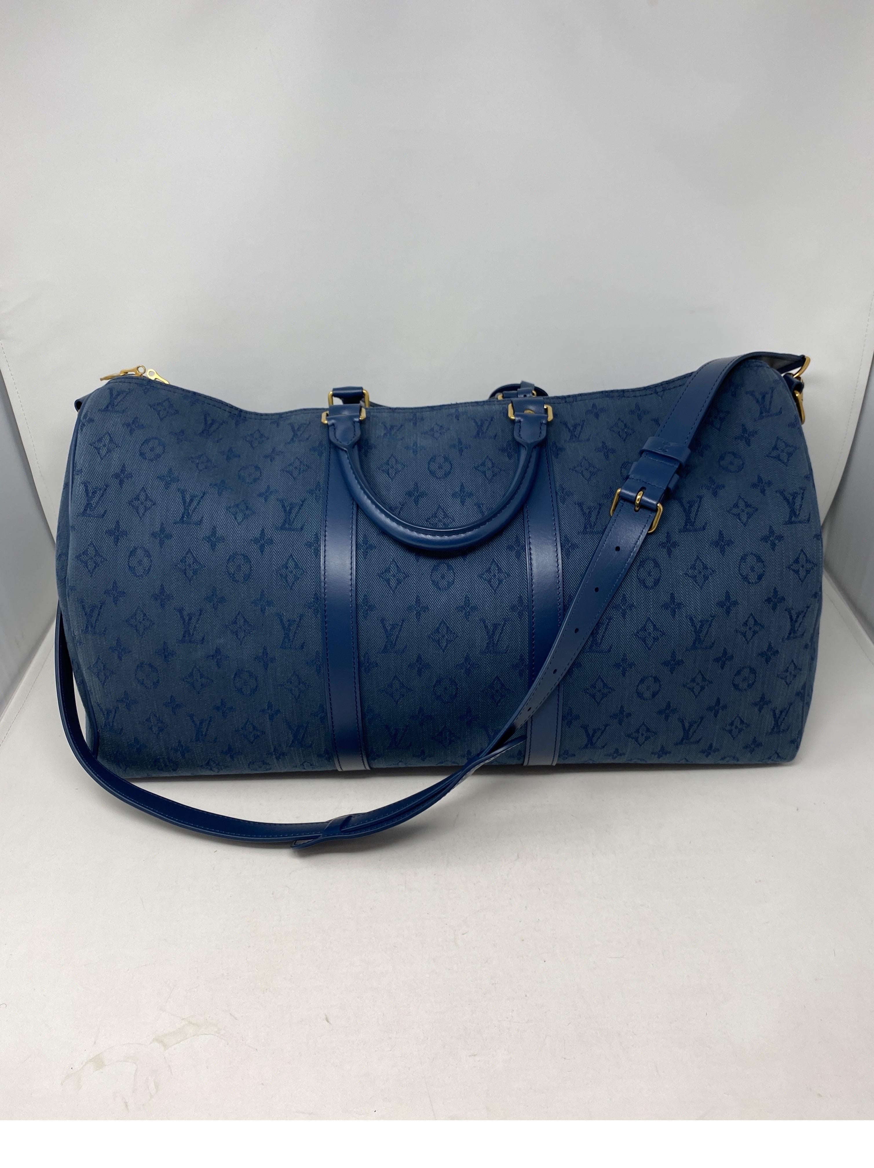 Louis Vuitton Denim 50 Bandouliere. Rare and limited edition. Collector's piece. Brand new condition. Includes strap, luggage tag, lock and keys. Guaranteed authentic. 