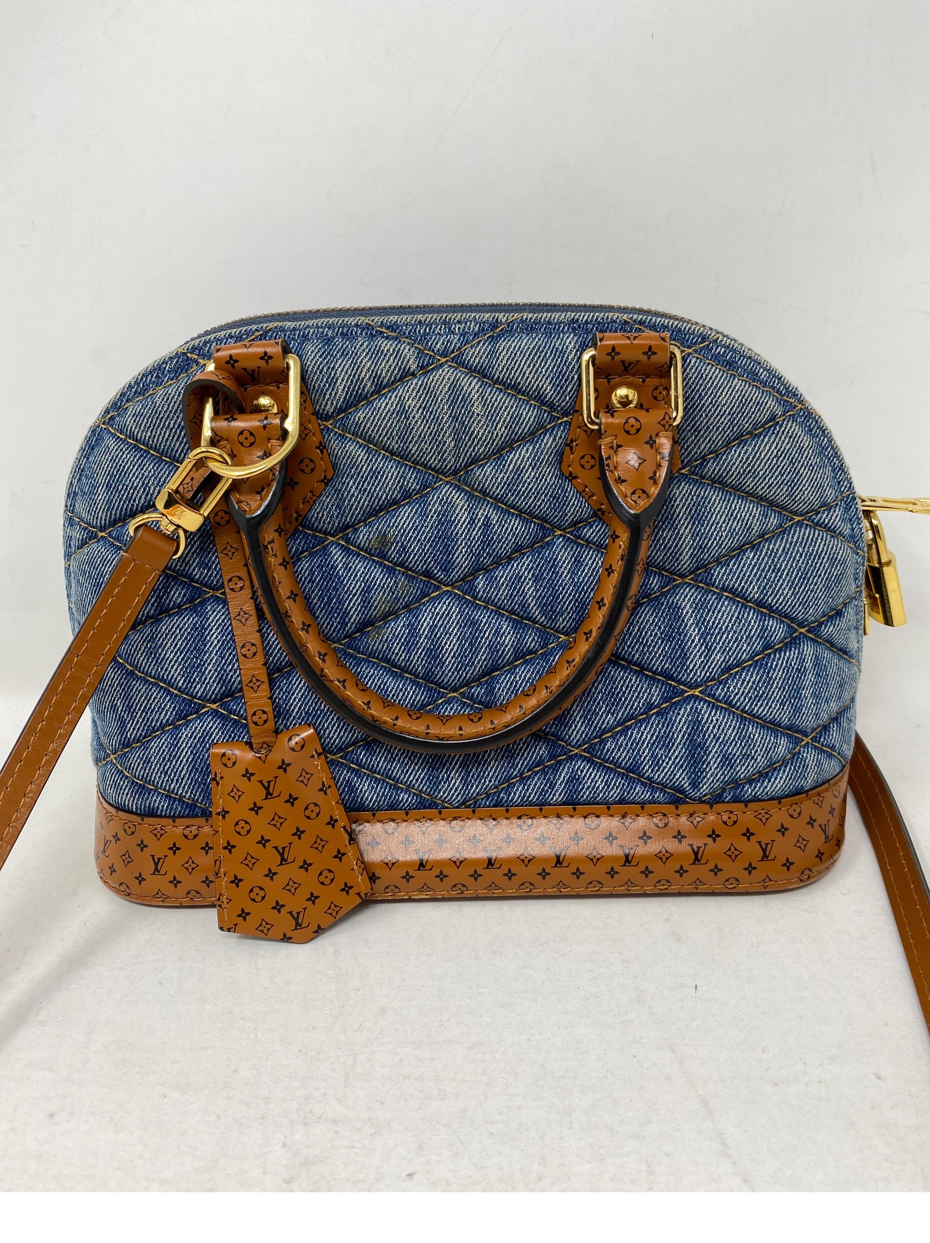 Louis Vuitton Denim and Leather Alma BB Bag. Excellent condition. Rare and limited. Cute mini size bag. Can be worn crossbody or a top handle bag. Guaranteed authentic. 