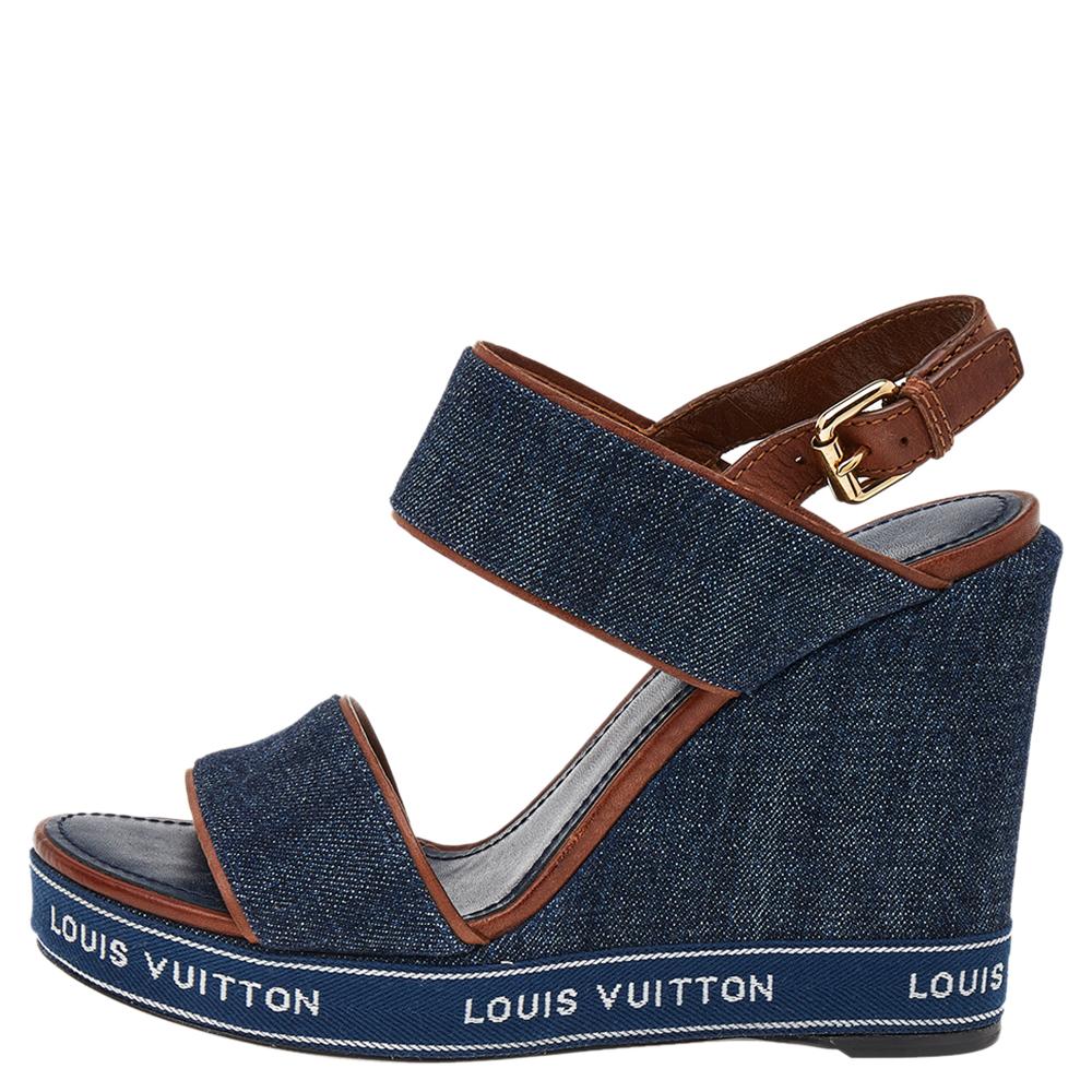 Choose these stylish sandals from the house of Louis Vuitton for an effortlessly fashionable look. They come made of denim and feature leather trims, open toes, buckled ankle straps, and wedge heels.

Includes: Original Dustbag
