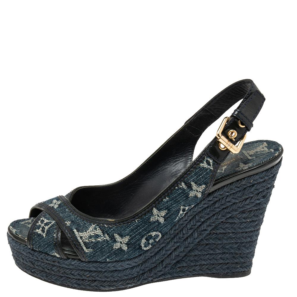 Known for its luxury shoes and leather goods, Louis Vuitton is sure to delight you with these wedge sandals. The sandals are crafted from patent leather and monogram denim and feature a criss-cross style with ankle straps. They come with