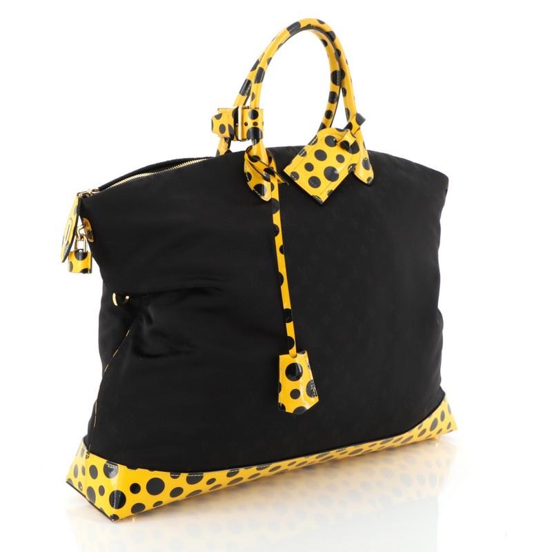 This Louis Vuitton Desire Lockit Bag Kusama Infinity Dots Monogram Nylon GM, crafted from black monogram nylon with yellow and black polka dot patent leather trims, features dual rolled patent leather handles, and gold-tone hardware. Its zip closure