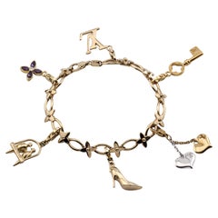 Louis Vuitton Charm-Armband aus 18 Karat Gelbgold mit Diamanten und Amethysten