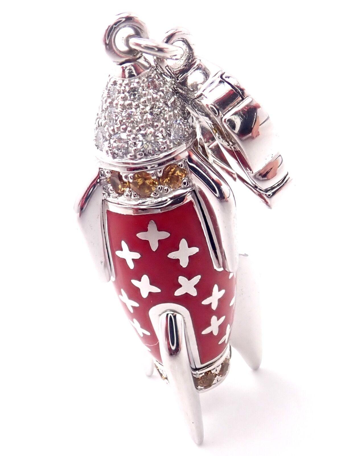18k White Gold Diamond Enamel Rocket Ship Charm Pendant by Louis Vuitton. 
With Round brilliant cut diamonds VVS1 clarity, E color 
Round Yellow Sapphire stones
Details:
Measurements:  1 3/4