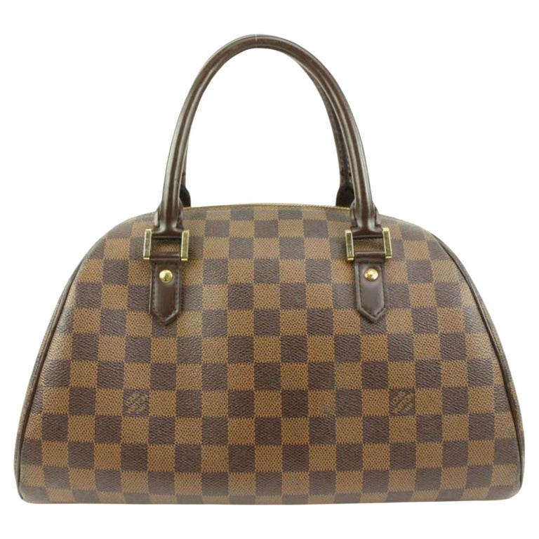 Louis Vuitton damier style accent wall - Traditional - New York