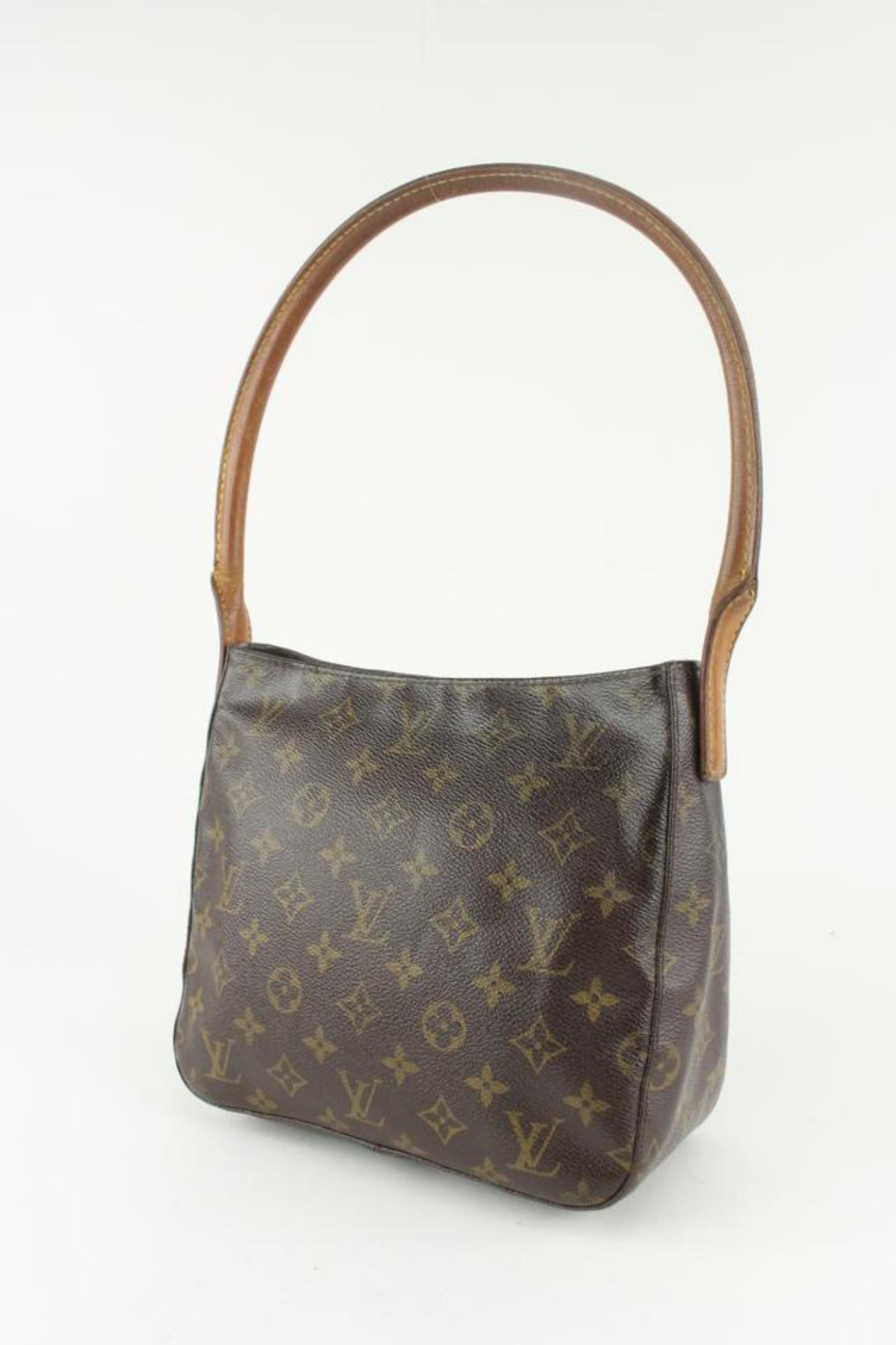 Louis Vuitton Discontinued Monogram Looping MM Zip Hobo Shoulder Bag 1216lv33
Date Code/Serial Number: SD0081
Made In: U.S.A
Measurements: Length:  9