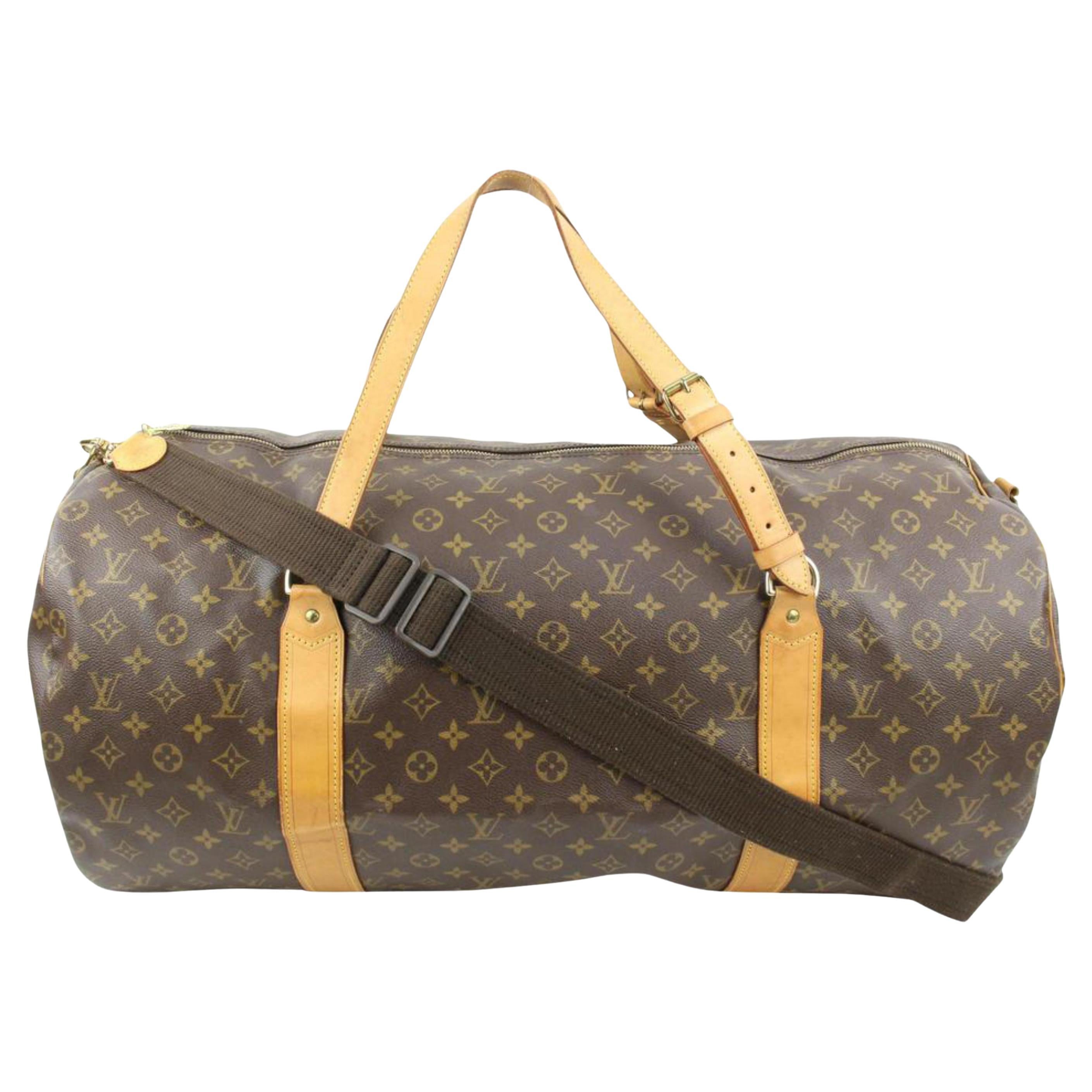Louis Vuitton Discontinued Monogram Sac Polochon 70 Keepall Bandouliere  125lv36 For Sale at 1stDibs