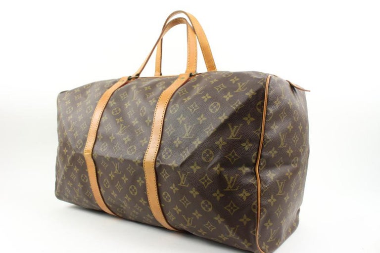 Sac souple leather travel bag Louis Vuitton Brown in Leather