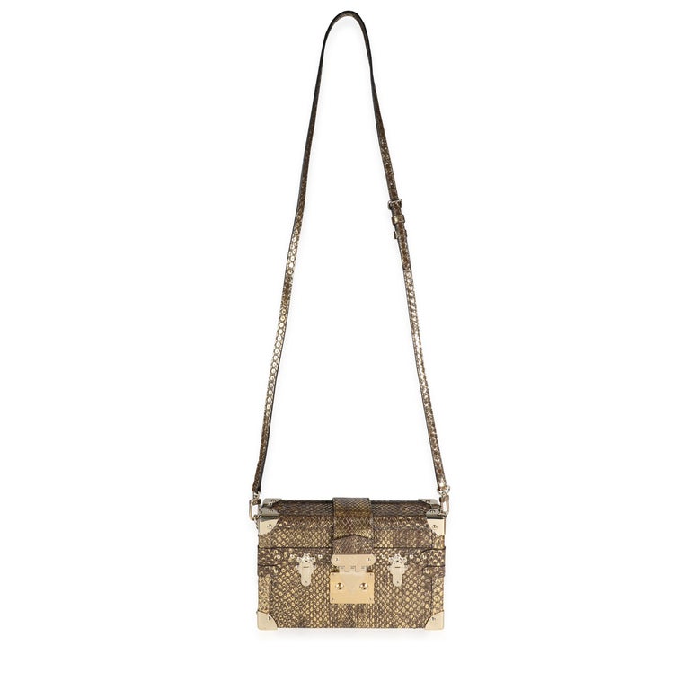 Listing Title: Louis Vuitton Distressed Metallic Gold Python Petite Malle
SKU: 117643
Condition: Pre-owned (3000)
Condition Description: The Petite Malle mini trunk pays homage to the trunk-making legacy of Louis Vuitton. With design elements taken