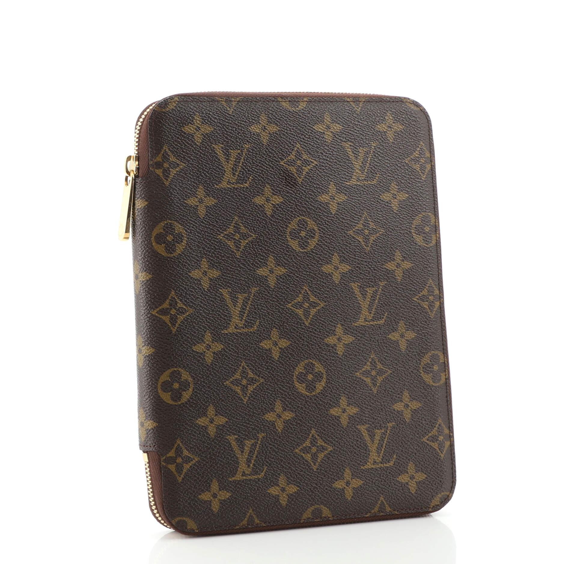 Past auction: Group of Louis Vuitton garment/document holders; and