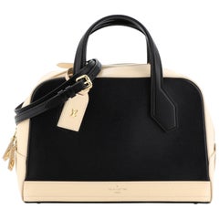 Louis Vuitton Dora Handbag Leather PM
