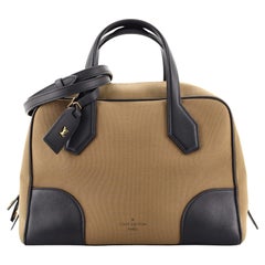 Louis Vuitton Dora Soft Handbag Canvas MM