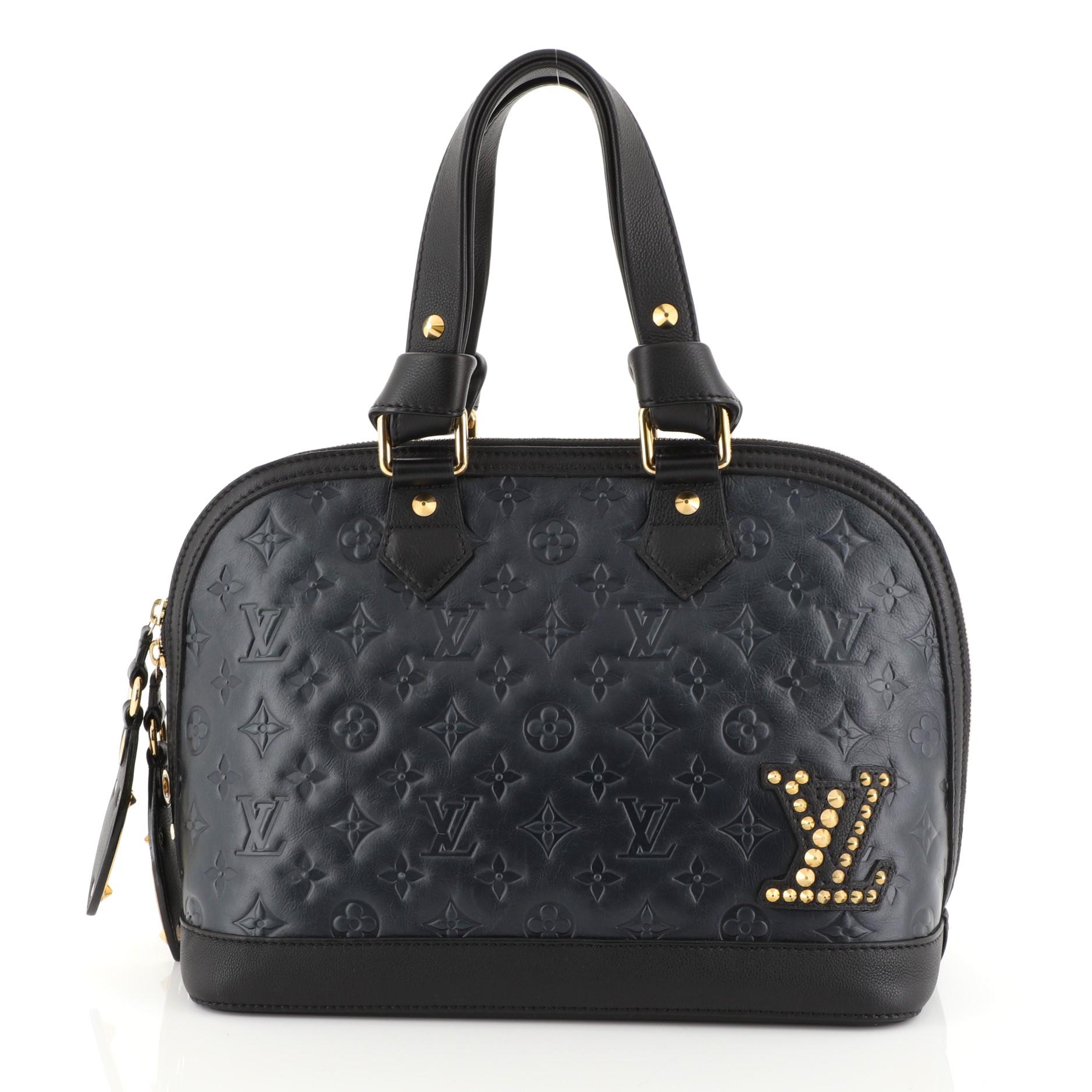Louis Vuitton Double Jeu Neo Alma Bag Monogram Embossed Leather In Good Condition In NY, NY