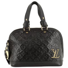 Louis Vuitton Double Jeu Neo Alma Bag Monogram Embossed Leather