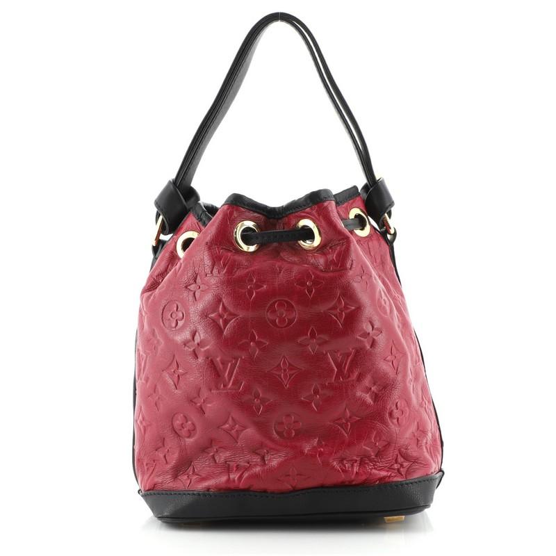 Louis Vuitton Double Jeu Neo Noe Tasche aus geprägtem Leder mit Monogramm im Zustand „Gut“ in NY, NY